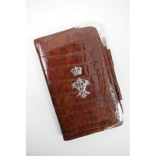 140 - Queen Victoria interest: a late Victorian silver mounted crocodile skin note wallet by Drew & Sons, ... 