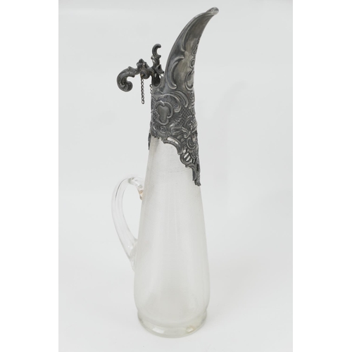 166 - Continental pewter mounted claret jug, late 19th Century, the vessel of finely reeded clear glass wi... 