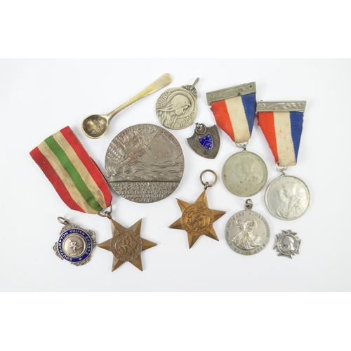 208 - The Lusitania medallion; also Second World War medals including 39-45 Star and Italy Star; two Birke... 