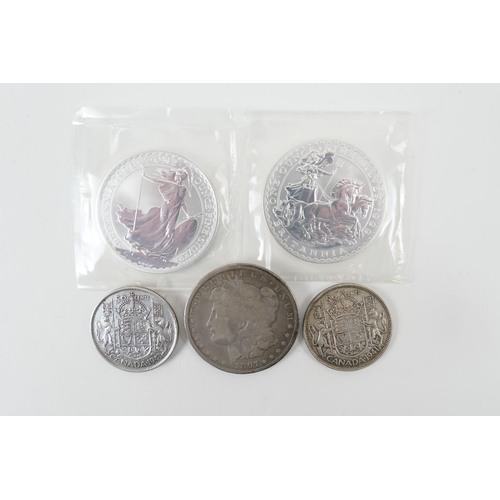 214 - Two Britannia £2 fine silver coins, 1998 and 1999, gross weight approx. 66g; also a USA Morgan dolla... 