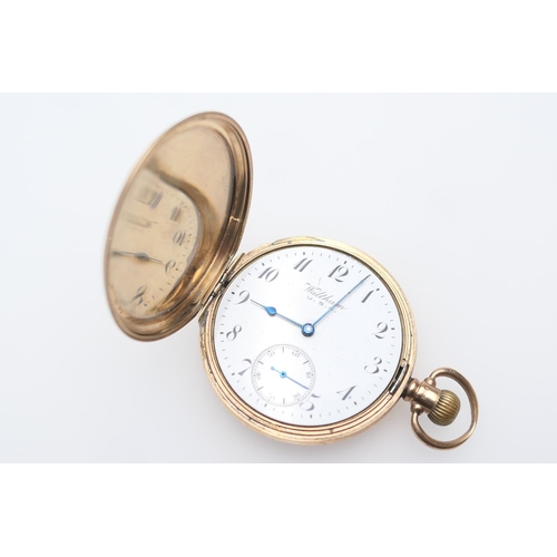 244 - Waltham 9ct gold cased hunter pocket watch, the outer case engraved with a monogram, white dial with... 