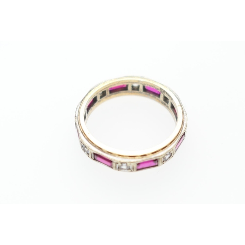 247 - 9ct gold eternity ring, set with rectangular cut rubies and round cut white stones, probably sapphir... 