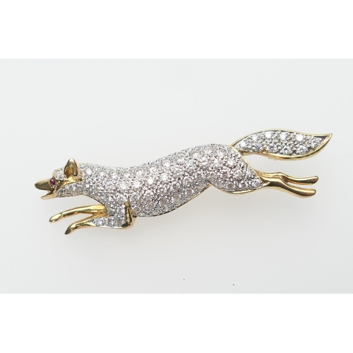 262 - Diamond pave running fox brooch, set with small round cut diamonds and a single ruby eye, set in unm... 