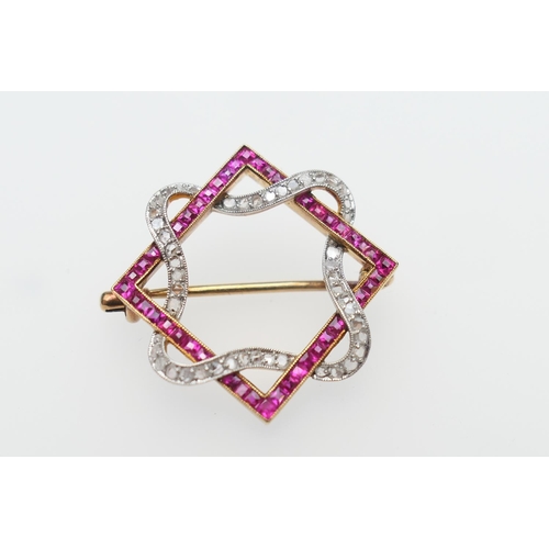 264 - Diamond and ruby openwork brooch, formed as a square intertwined with a ribbon of diamonds, the squa... 