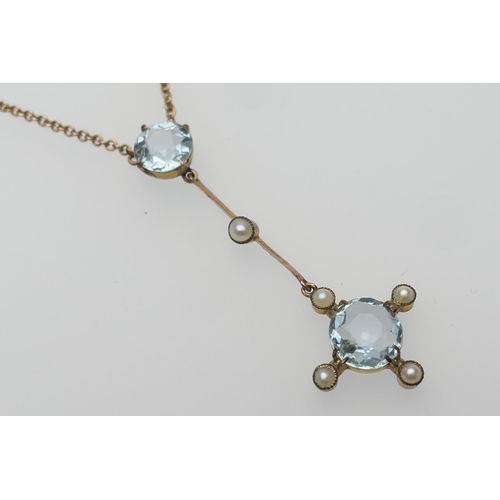 270 - 9ct gold aquamarine and pearl pendant necklace, set with two round cut aquamarines, the largest 7mm ... 