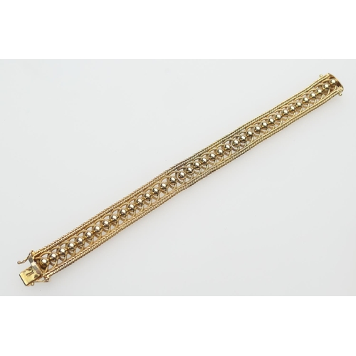 284 - 9ct gold bead and herringbone chain bracelet, length 19cm, weight approx. 25.6g