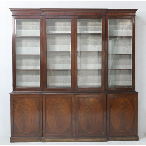 627 - Late 19th Century mahogany and inlaid breakfront library bookcase, in Georgian style, having a mould... 