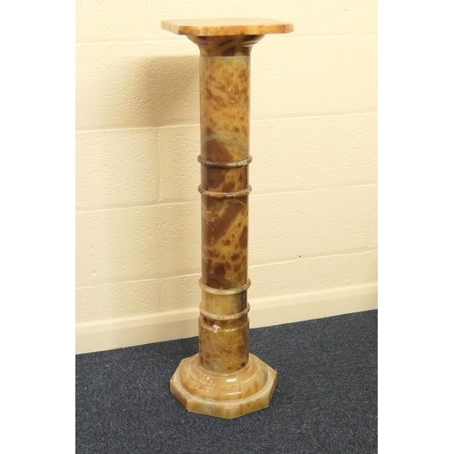 632 - Alabaster torchere, square top over a column with an octagonal base, height 97cm, width 26cm