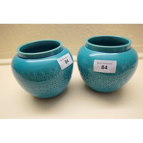 84 - Pair of Burmantofts faience vases, turquoise glazed and with impressed banded decoration, height 12c... 