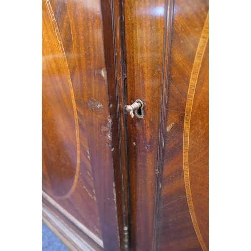 627 - Late 19th Century mahogany and inlaid breakfront library bookcase, in Georgian style, having a mould... 