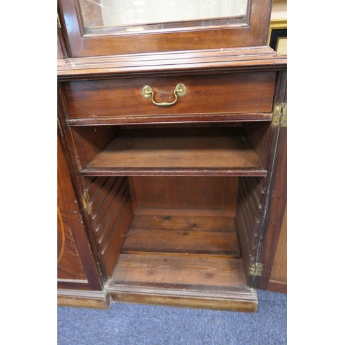 627 - Late 19th Century mahogany and inlaid breakfront library bookcase, in Georgian style, having a mould... 