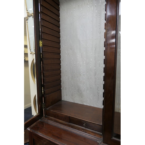 627 - Late 19th Century mahogany and inlaid breakfront library bookcase, in Georgian style, having a mould... 