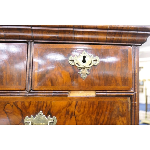 639 - Walnut chest on stand, early 18th Century and later, the top with moulded cornice over three short a... 