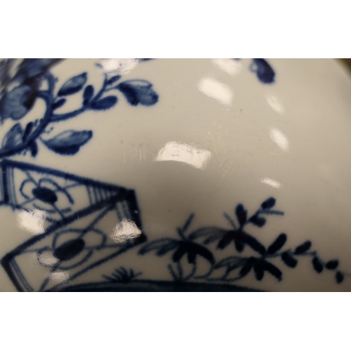 100 - Worcester blue and white large bowl, in the  prunus fence pattern, circa 1755, painted workman's mar... 