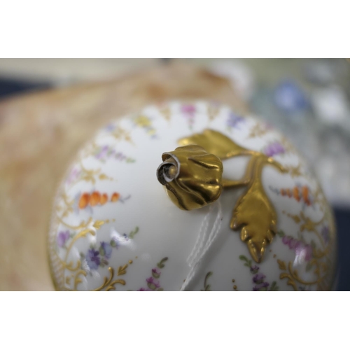 43 - Meissen porcelain covered bowl, with a gilded bud finial, decorated with pendant flowers falling fro... 