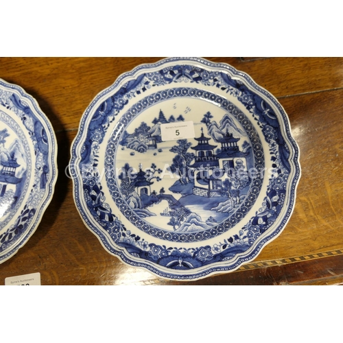 5 - Three Chinese blue and white plates, late 18th Century, decorated with a pagoda landscape design wit... 