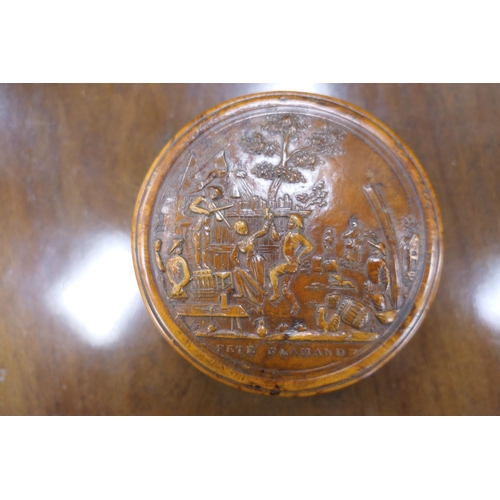 390 - Pressed burr wood circular snuff box, 19th Century, the cover decorated with a scene of revellers, t... 