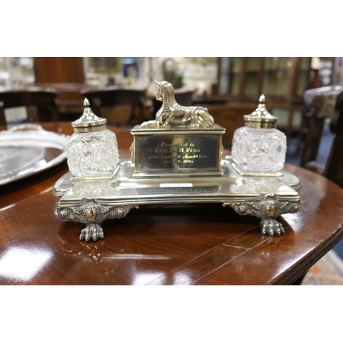 125 - Late Victorian silver plated presentation inkstand, circa 1895, shaped rectangular stand supporting ... 