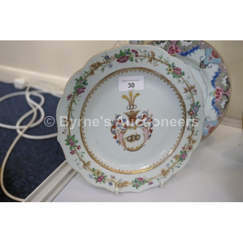 30 - Five Chinese famille rose plates, all 18th Century, including an armorial plate, 22.5cm; Mandarin st... 