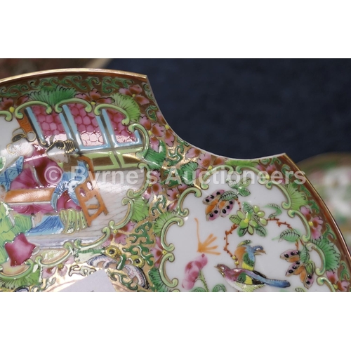 51 - Chinese Canton famille rose dessert service, early 19th Century, typically decorated with panels of ... 