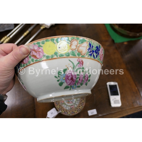 58 - Provincial Chinese famille rose bowl, 19th Century, sparsely decorated with a border of flowers and ... 