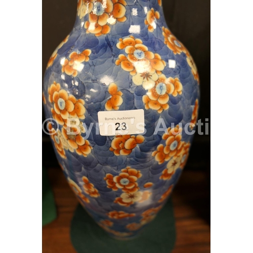 23 - Chinese clobbered blue and white vase, late 19th Century, decorated with prunus blossom, and later p... 