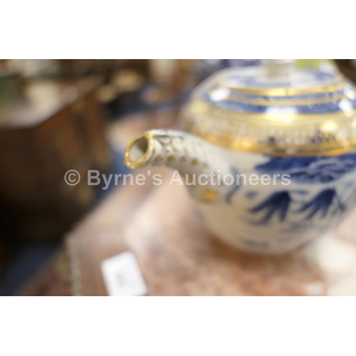 50 - Chinese blue and white bullet shaped teapot and cover, late 18th Century, decorated with a pagoda la... 