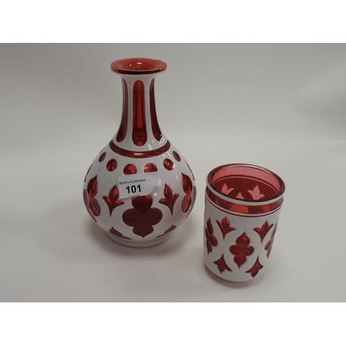 101 - Bohemian ruby and white overlay bottle carafe and beaker, the carafe 19cm (2)