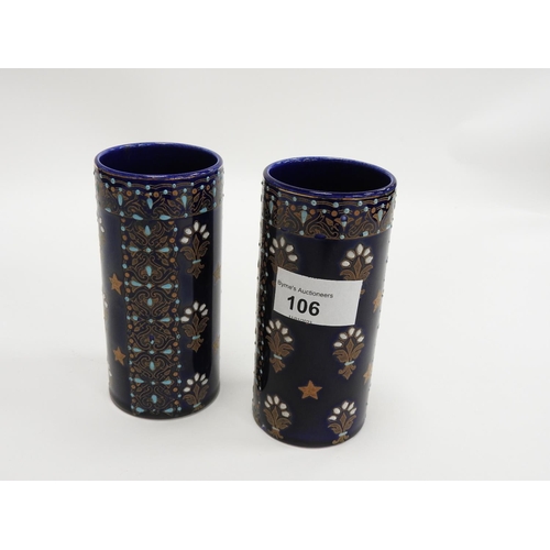 106 - Pair of French blue and enamel jewelled cylinder vases, marked 'BFK', height 12.5cm