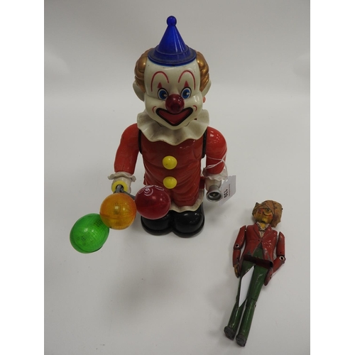 139 - Botoy, battery operated clown toy; also a Luntoy cast metal marionette (2)