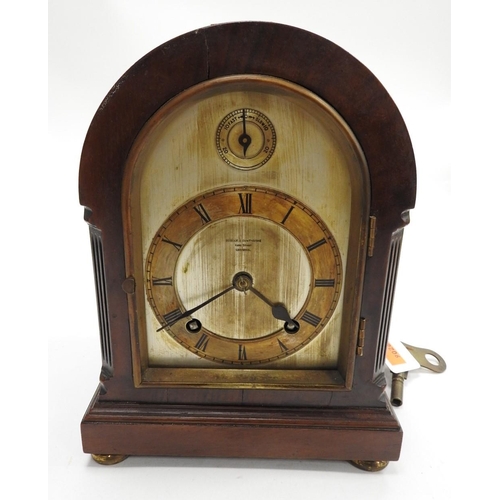 141 - Boodle & Dunthorne walnut cased chiming mantel clock