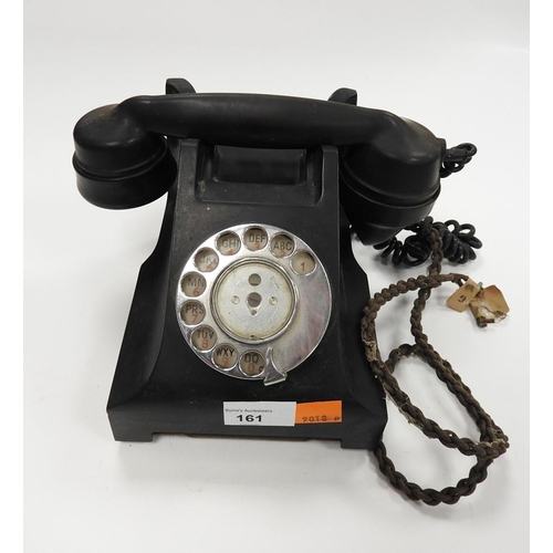 161 - Old black Bakelite dial telephone