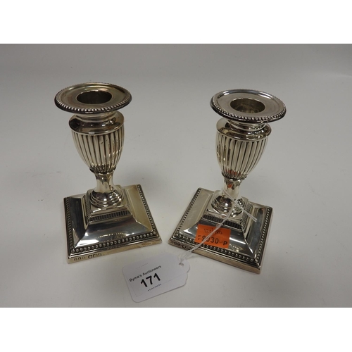 171 - Pair of late Victorian silver dwarf candlesticks, Sheffield 1894 (loaded), height 11.5cm