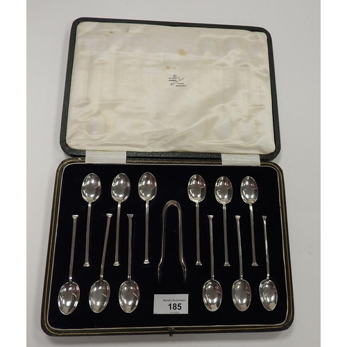 185 - Set of twelve George V silver hobnail teaspoons, Sheffield 1921, and sugar tongs, gross weight appro... 