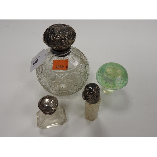 186 - Silver mounted cut glass globular scent bottle (af), two further silver mounted glass bottles and a ... 