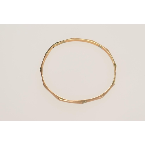 215 - 9ct gold faceted bangle (af), weight 5.1g