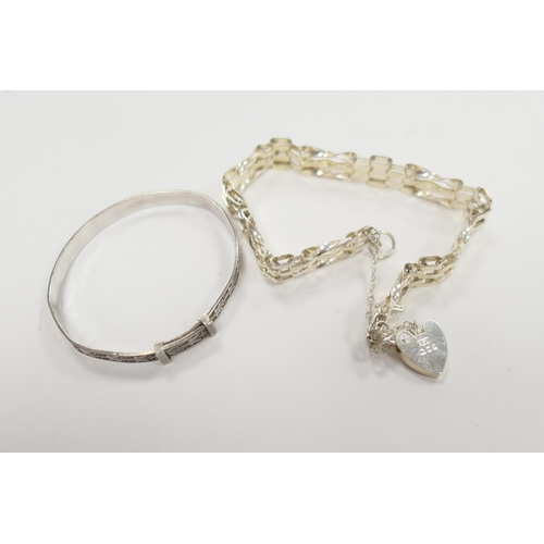 253 - Child's silver bracelet and a silver gatelink bracelet with padlock clasp (2)