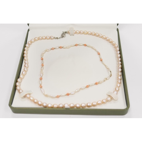 267 - Freshwater pearl necklace, the pearls approx. 7mm, length 57cm; also a freshwater pearl and coral ch... 