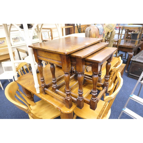 446 - Nest of solid oak occasional tables, the largest 53.5cm