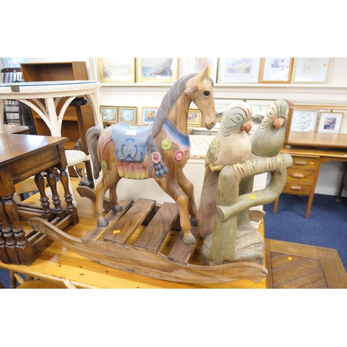 447 - Decorative carved and painted child's rocking horse, height 78cm; also carved wooden and painted par... 