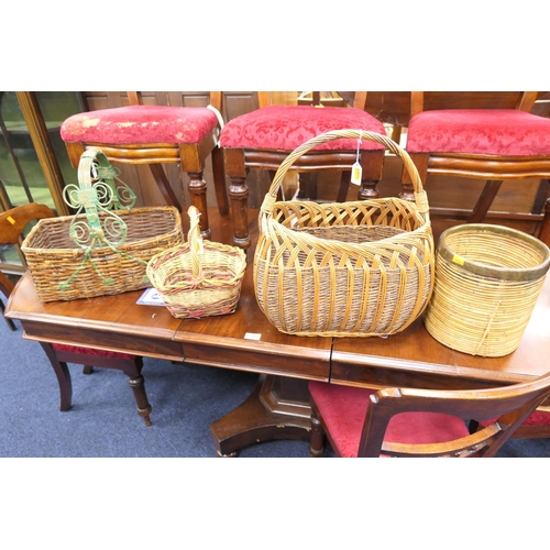 454 - Three decorative wicker baskets and a copper rimmed wicker bin (4)