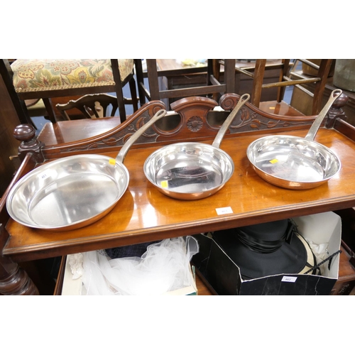 461 - Set of three French Bourgeat copper and steel skillets, the largest 30cm diameter