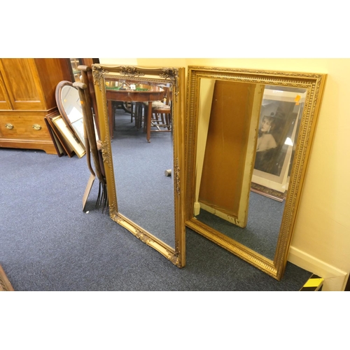 494 - Gilt swept framed bevelled glass wall mirror, 104cm; also a further gilt framed wall mirror, 100cm (... 