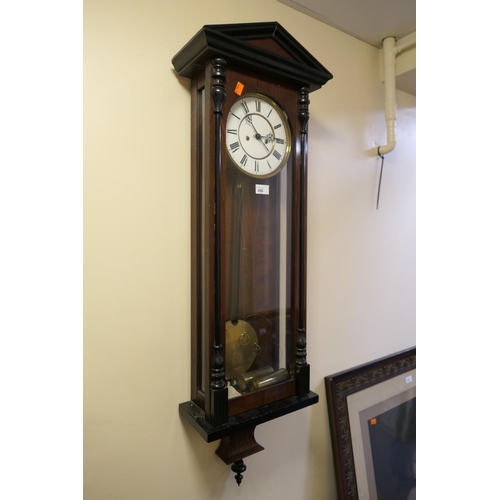 496 - Late Victorian Vienna walnut double weighted chiming wall clock, height 114cm, with pendulum and wei... 