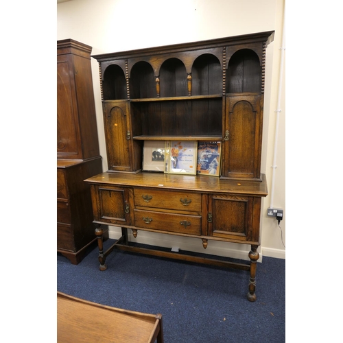 500 - George V oak dresser in the Jacobean Revival style, width 153cm, height 200cm