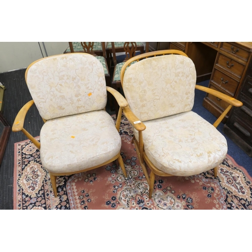 511 - Pair of Ercol beech comb back open armchairs with cushions