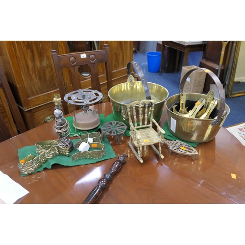 537 - Mixed brass wares including jam pans, figural table lamp, curtain tie-backs and ornamental items inc... 