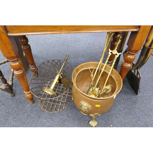 556 - Mixed brass wares including companion stands, fire irons, coal depot etc.