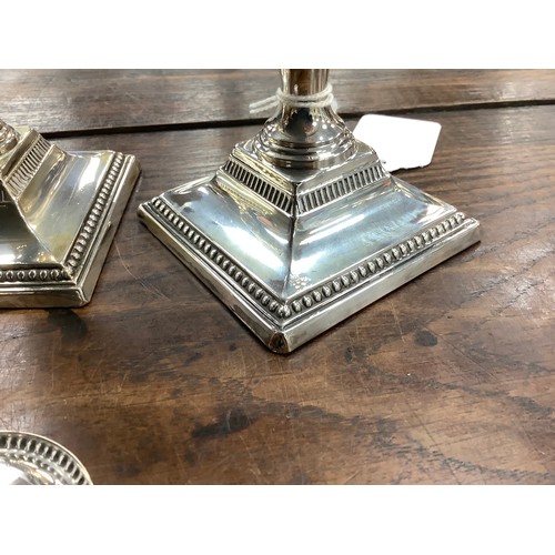 171 - Pair of late Victorian silver dwarf candlesticks, Sheffield 1894 (loaded), height 11.5cm