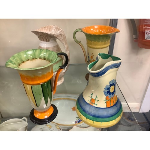 108 - Collection of nine Art Deco pottery jugs including Myott and others